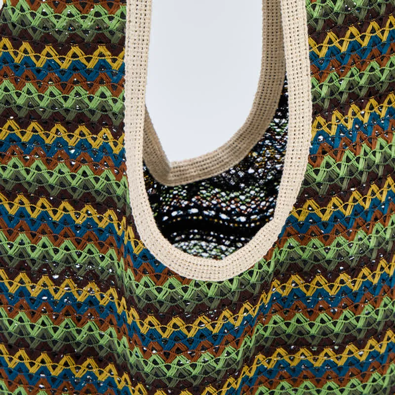 Grüne Schultertasche mit Wellenstreifen