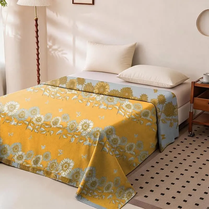 Wendbare Tagesdecke aus Baumwollgaze mit Sonnenblumen- und Schmetterlingsmotiven
