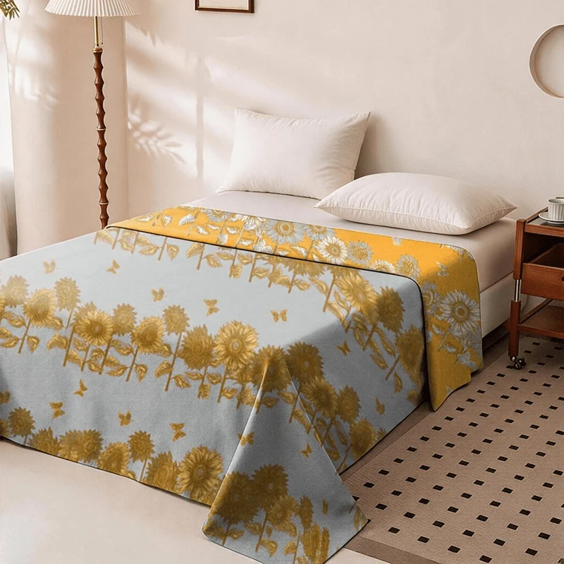 Wendbare Tagesdecke aus Baumwollgaze mit Sonnenblumen- und Schmetterlingsmotiven