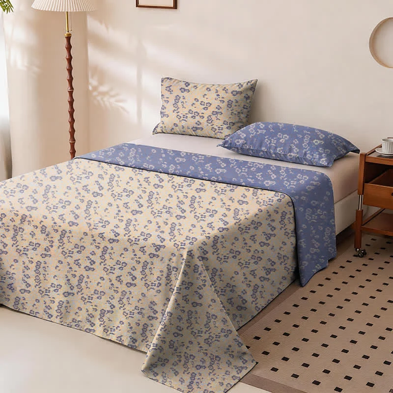 Wendbare Tagesdecke aus Baumwolle mit kleinem Blumenmuster