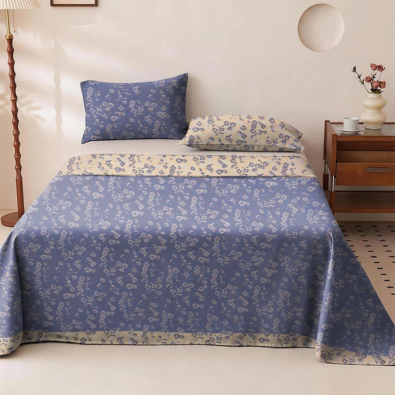 Wendbare Tagesdecke aus Baumwolle mit kleinem Blumenmuster