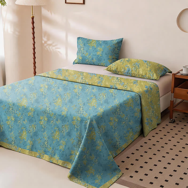 Wendbare Tagesdecke aus Baumwolle mit Vintage-Blumenmuster