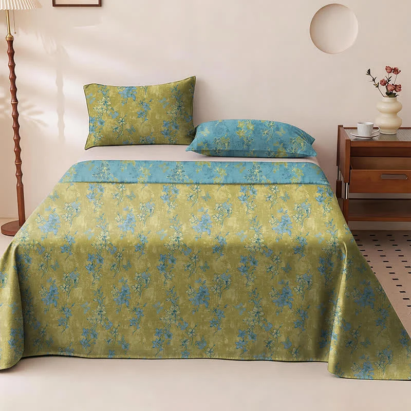 Wendbare Tagesdecke aus Baumwolle mit Vintage-Blumenmuster