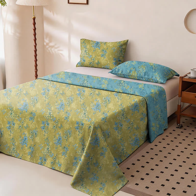 Wendbare Tagesdecke aus Baumwolle mit Vintage-Blumenmuster