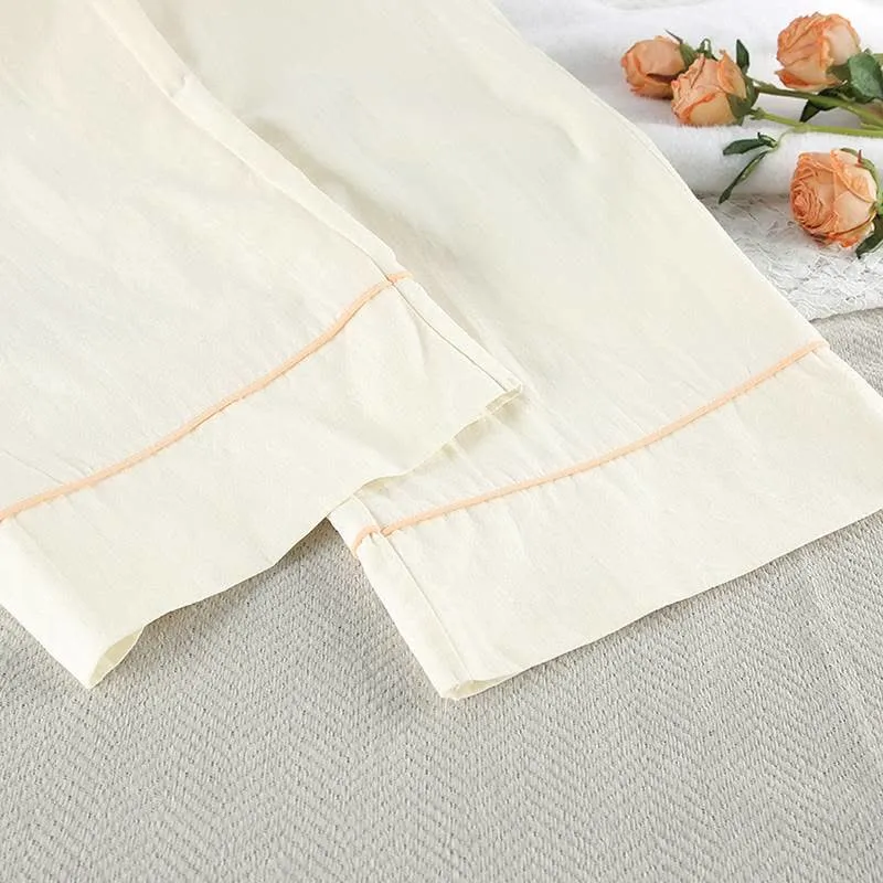 Minimalistischer Baumwoll-Pyjama-Set mit langen Ärmeln und Taschen