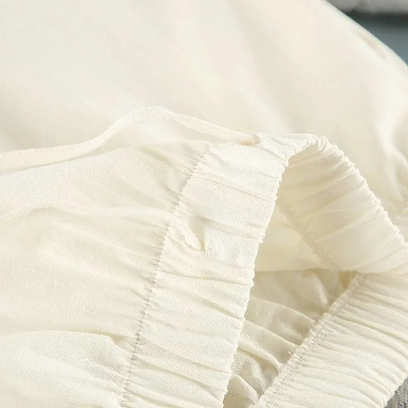 Minimalistischer Baumwoll-Pyjama-Set mit langen Ärmeln und Taschen