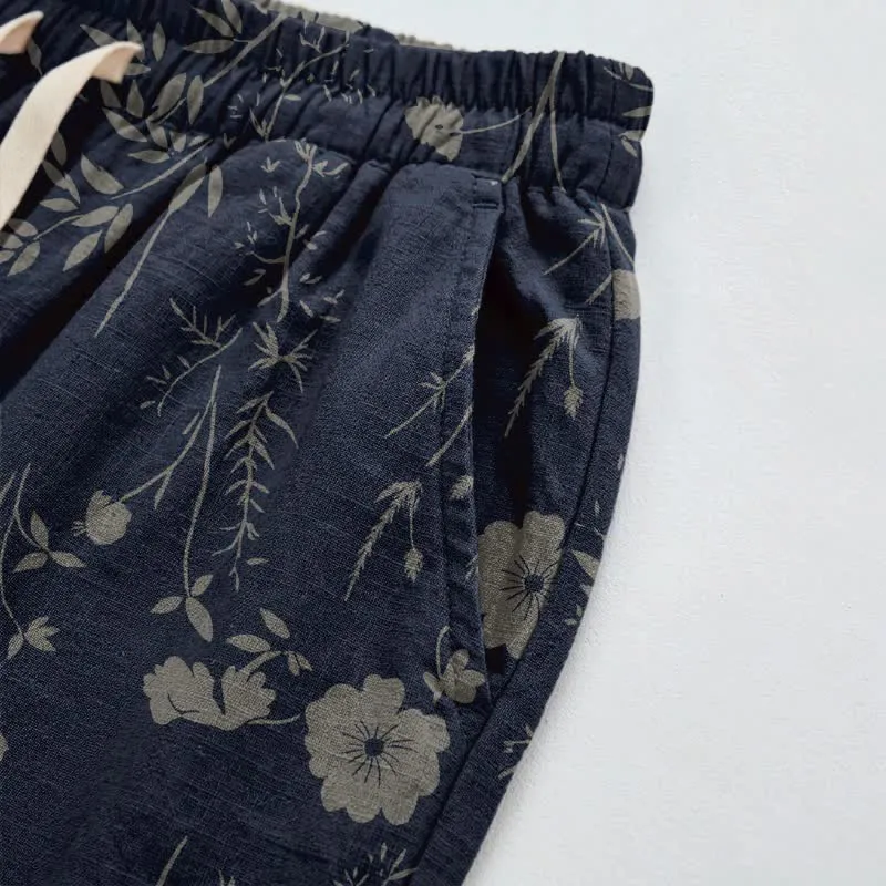 Marineblaue Loungehose aus Baumwollgewebe mit Wildblumenmuster
