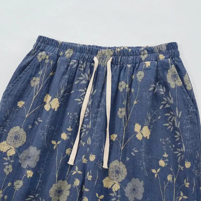 Marineblaue Loungehose aus Baumwollgewebe mit Wildblumenmuster