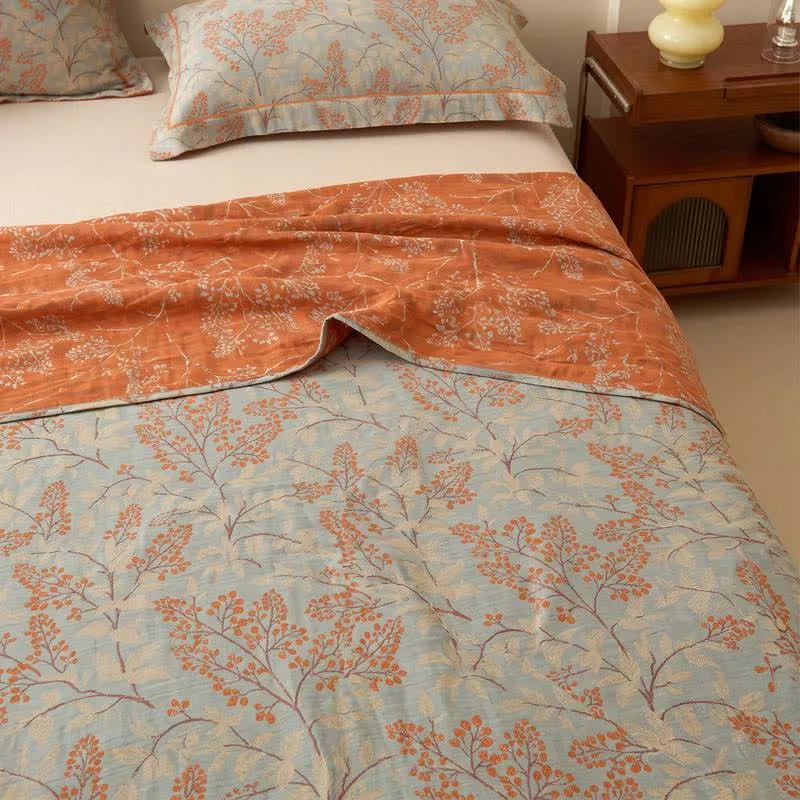 Wendbare Tagesdecke aus Musselin mit botanischem Zweig