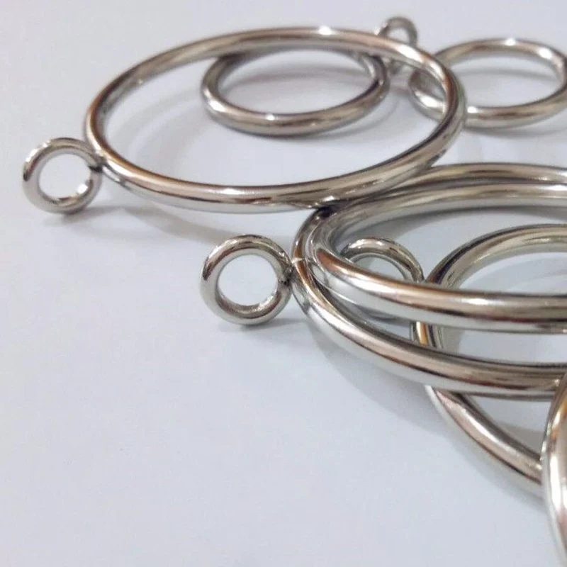 Gardinenringe aus Metall in Altmessing