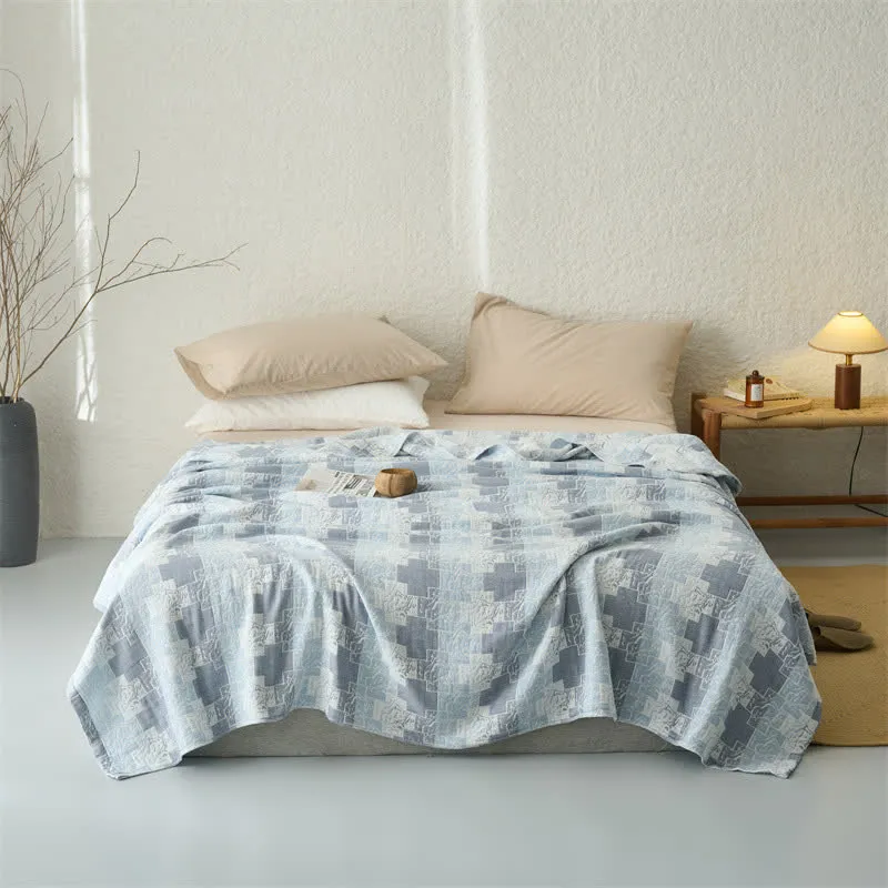Wendbare, geometrische Baumwoll-Musselin-Decke