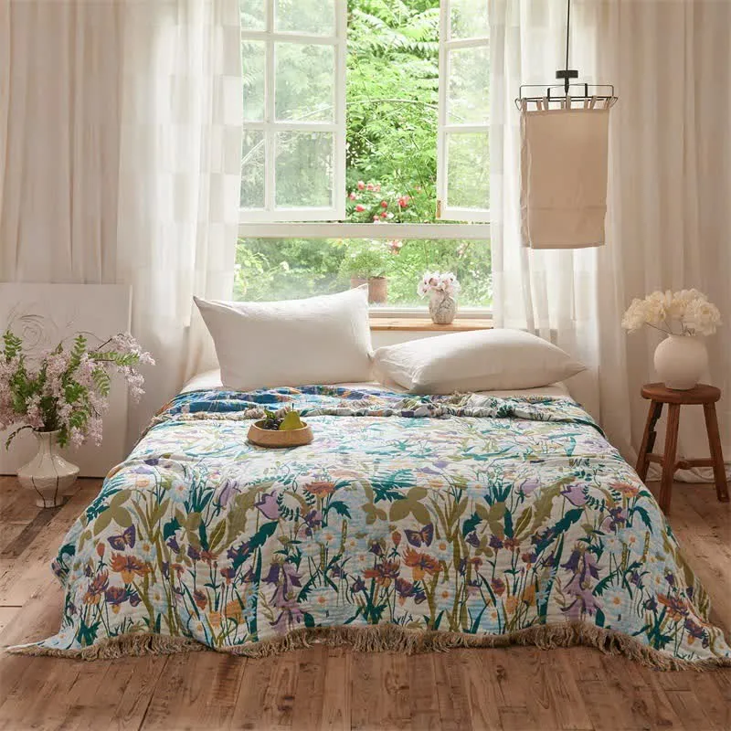 Wendbare Musselin-Decke mit botanischem Quastenmuster