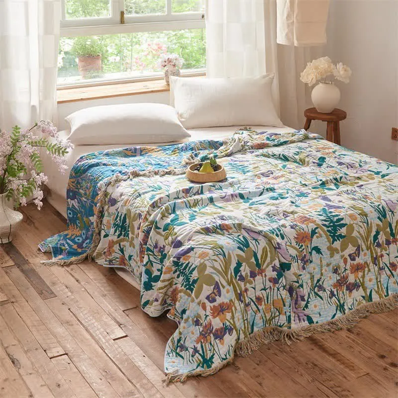 Wendbare Musselin-Decke mit botanischem Quastenmuster