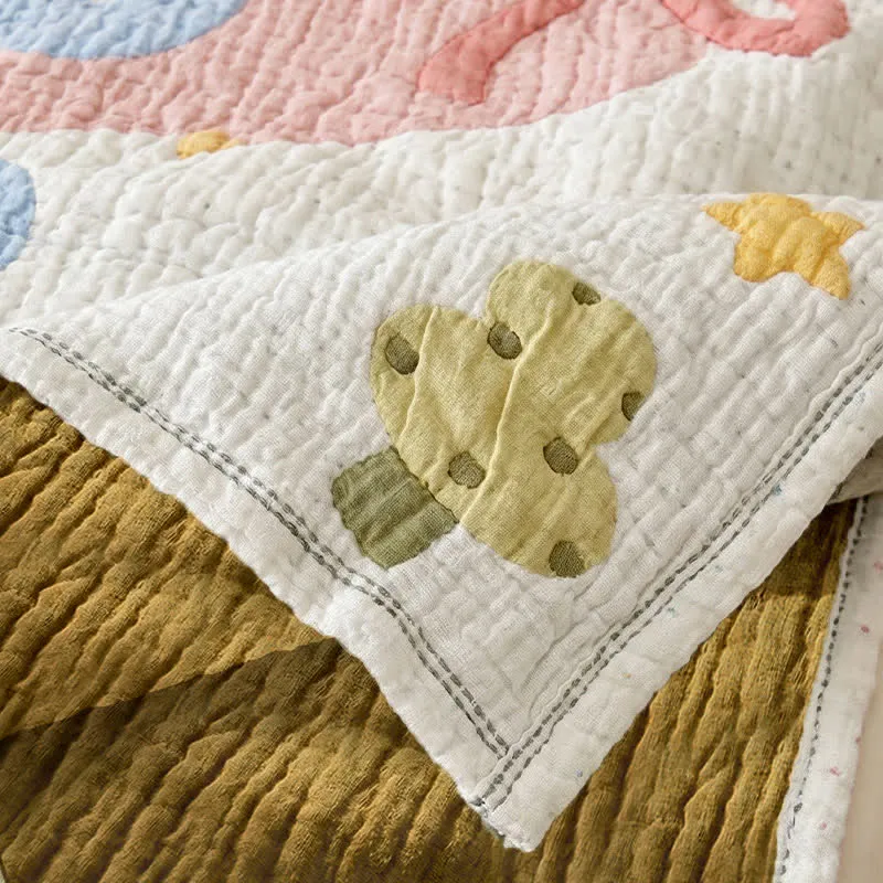 Babydecke aus Lyocell mit pastellfarbenem Elefantenmuster, gesteppt