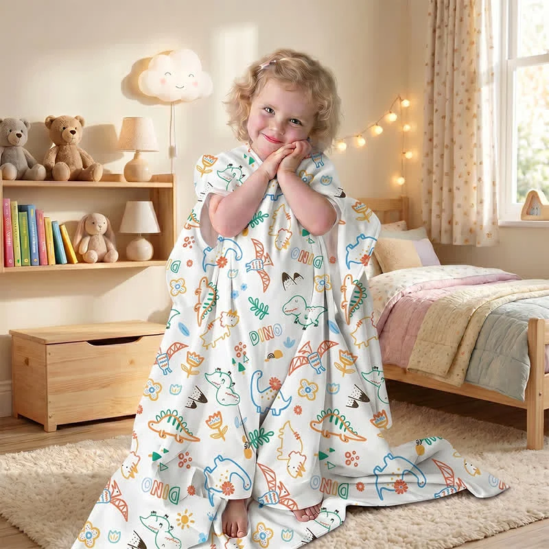 Dino Dreams Babydecke aus Baumwollgaze