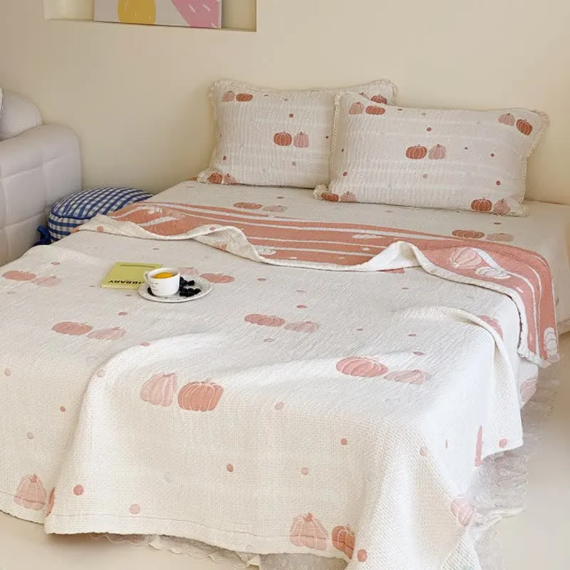 Sommerdecke aus gestepptem Lyocell in Creme-Kürbis-Optik