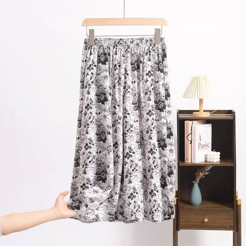 Vintage Schwarze geblümte Cropped Schlafhose