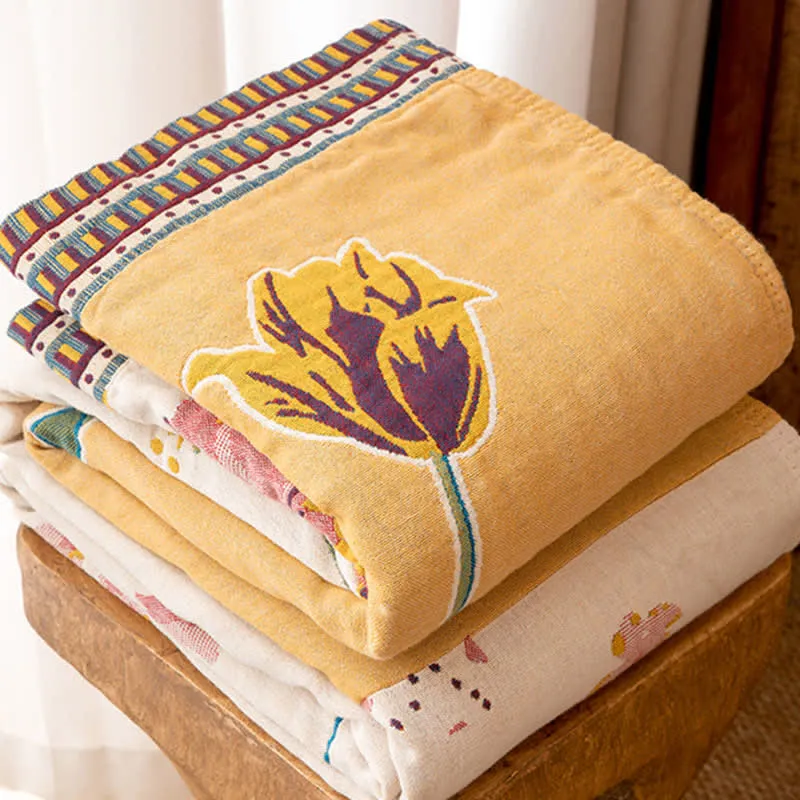 Sofadecke aus Baumwollgaze mit künstlerischem Patchwork-Blumenmuster