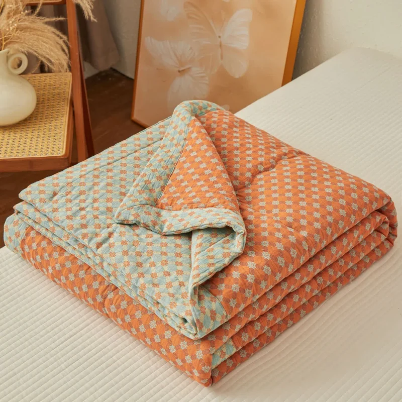 Wende-Steppdecke aus garngefärbtem Jacquard-Musselin