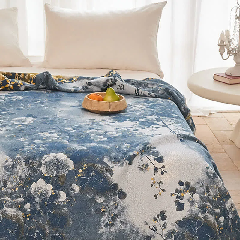 Blaue Aquarell-Blumen-Baumwoll-Musselin-Steppdecke