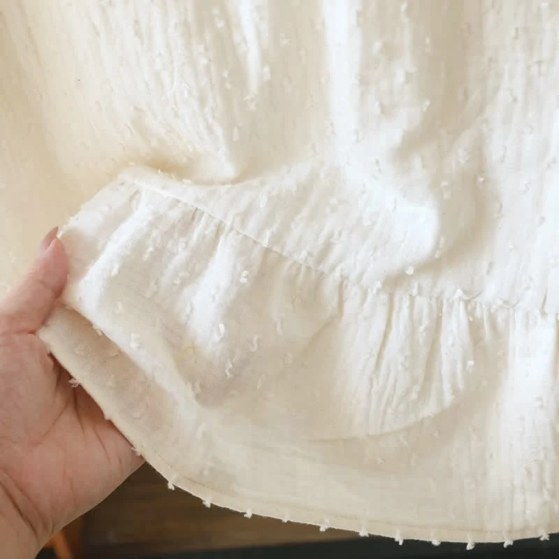 Beigefarbenes, strukturiertes, ärmelloses Loungekleid aus Baumwolle