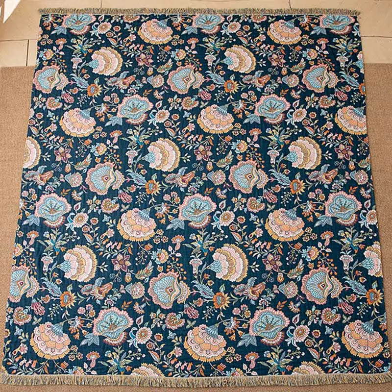 Boho-Sofadecke aus Baumwolle mit Blumenmuster und Quasten