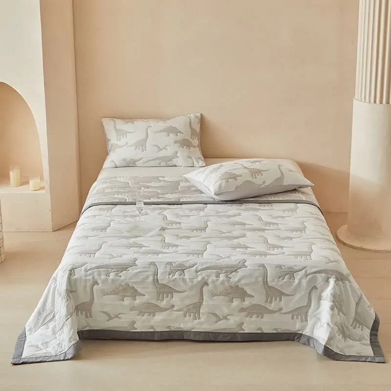 Wendbare Tagesdecke mit neutralem Dinosaurier-Print