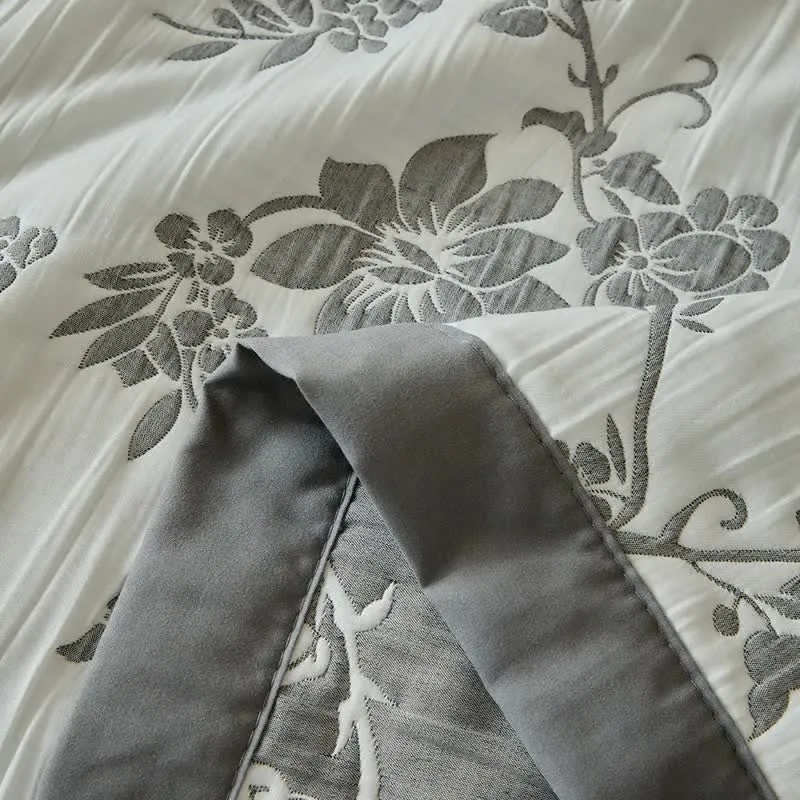 Wendebettwäsche-Set mit Zweig- und Blumenmuster