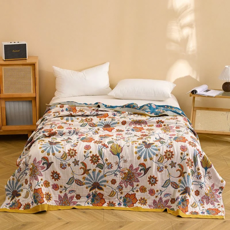 Wendbare Steppdecke aus Baumwollgaze mit Blumenmuster
