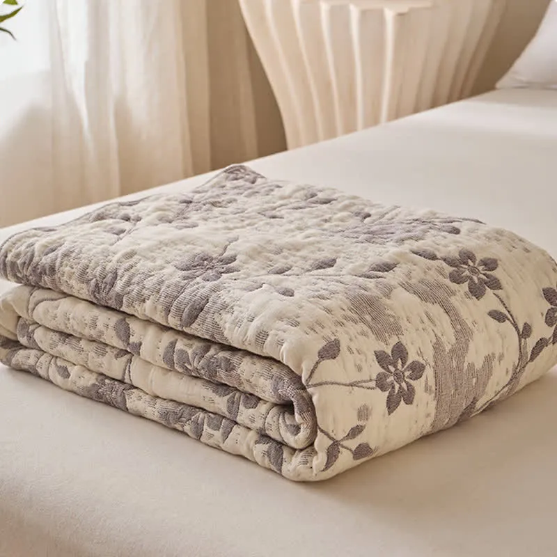 Patchworkdecke aus Baumwollgaze mit floralem Rankenmuster