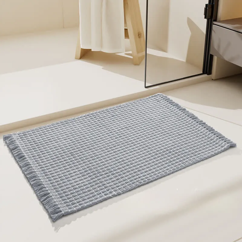 Gewebte Badematte mit Quasten