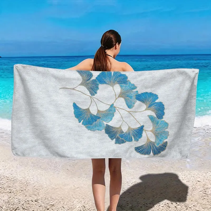 Elegantes Strandtuch mit blauem Ginkgoblatt