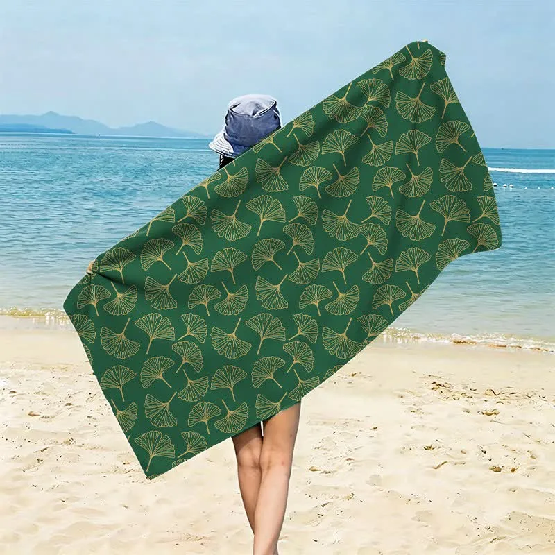Strandtuch mit Linienzeichnung eines Ginkgoblattes