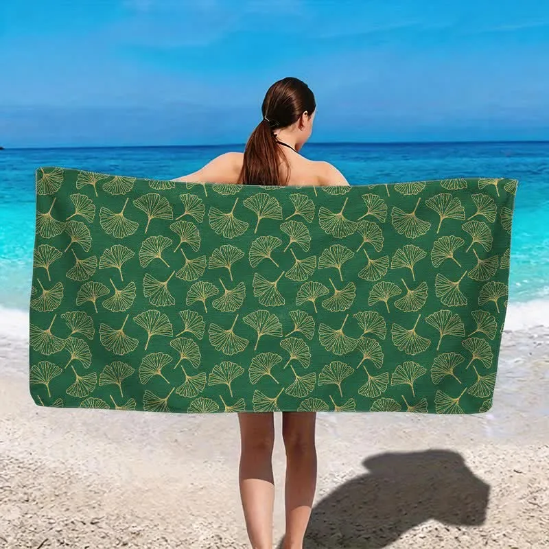 Strandtuch mit Linienzeichnung eines Ginkgoblattes