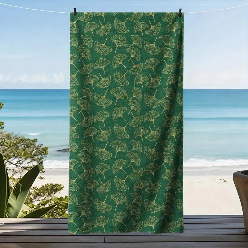 Strandtuch mit Linienzeichnung eines Ginkgoblattes