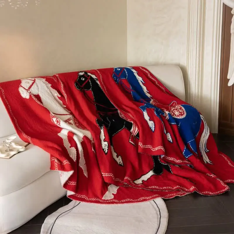 Festliche Strickdecke mit Pferdemotiv