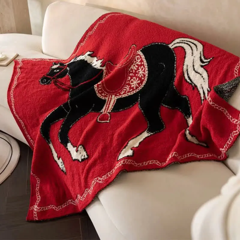 Festliche Strickdecke mit Pferdemotiv