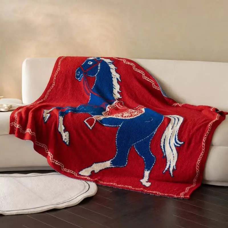 Festliche Strickdecke mit Pferdemotiv