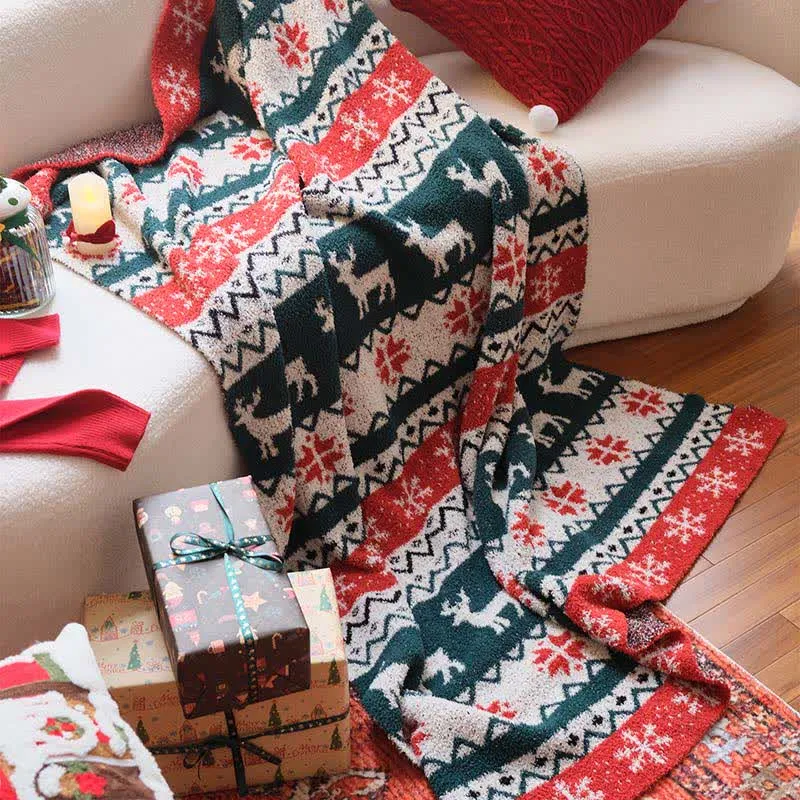 Weihnachtsdecke mit Rentiermotiv im Fair-Isle-Stil