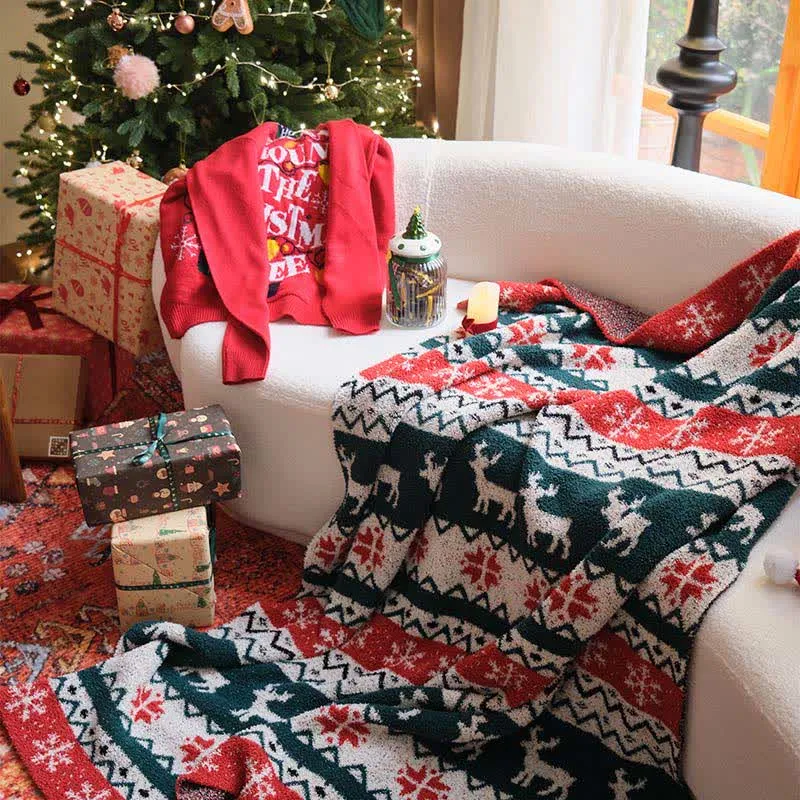 Weihnachtsdecke mit Rentiermotiv im Fair-Isle-Stil