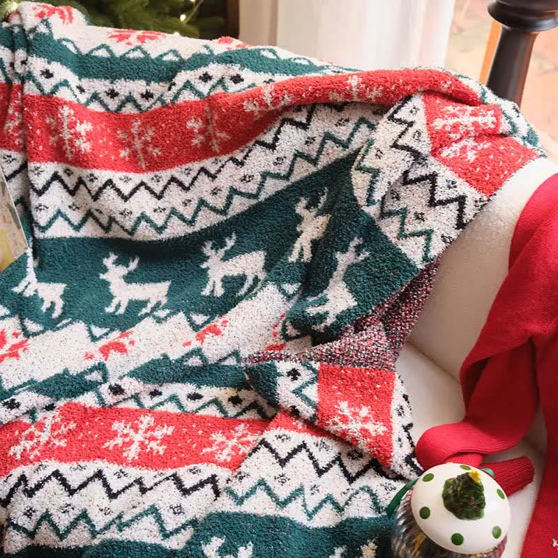 Weihnachtsdecke mit Rentiermotiv im Fair-Isle-Stil