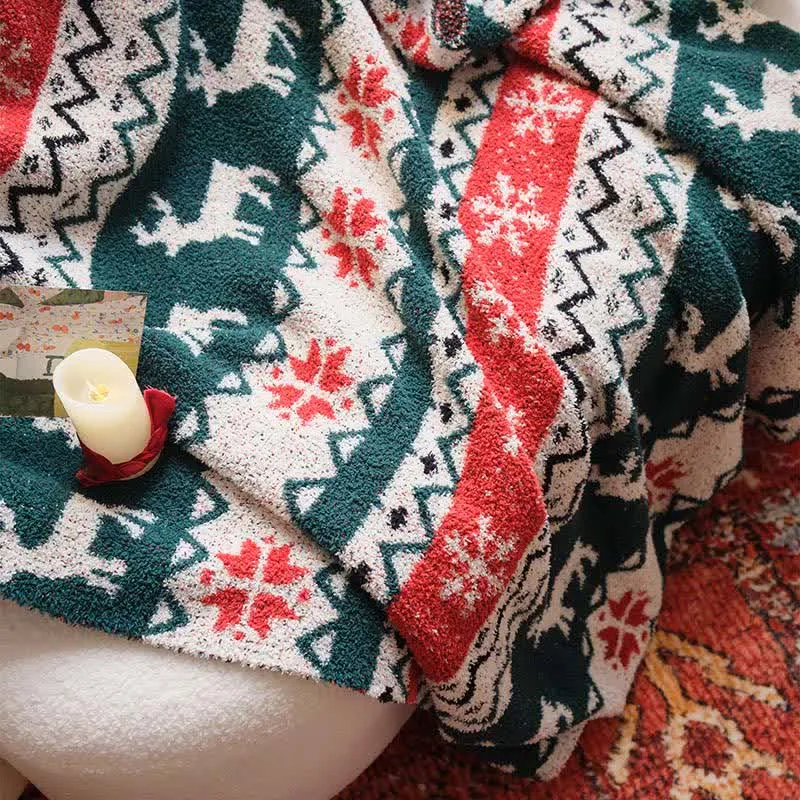 Weihnachtsdecke mit Rentiermotiv im Fair-Isle-Stil