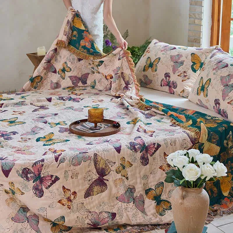 Elegante Baumwoll-Steppdecke mit Schmetterlingsquasten