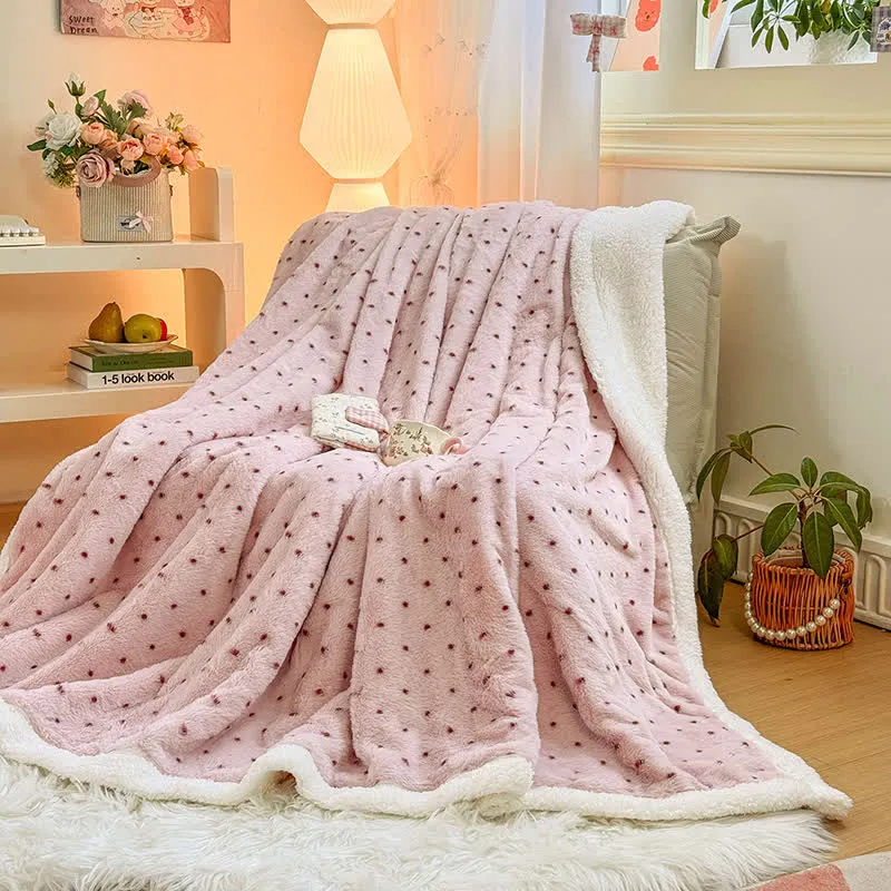 Warme Überwurfdecke mit rosa Punkten
