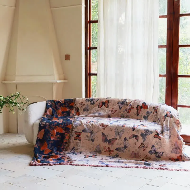 Elegante Sofadecke aus Baumwolle mit Schmetterlingsquasten