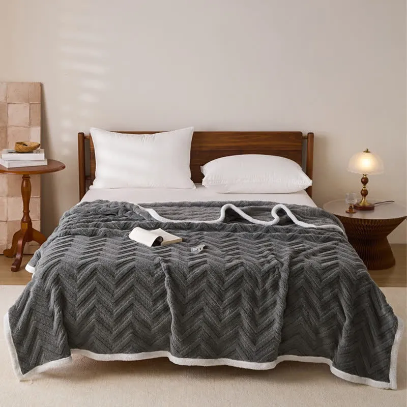 Moderne warme Jacquarddecke mit Chevron-Muster