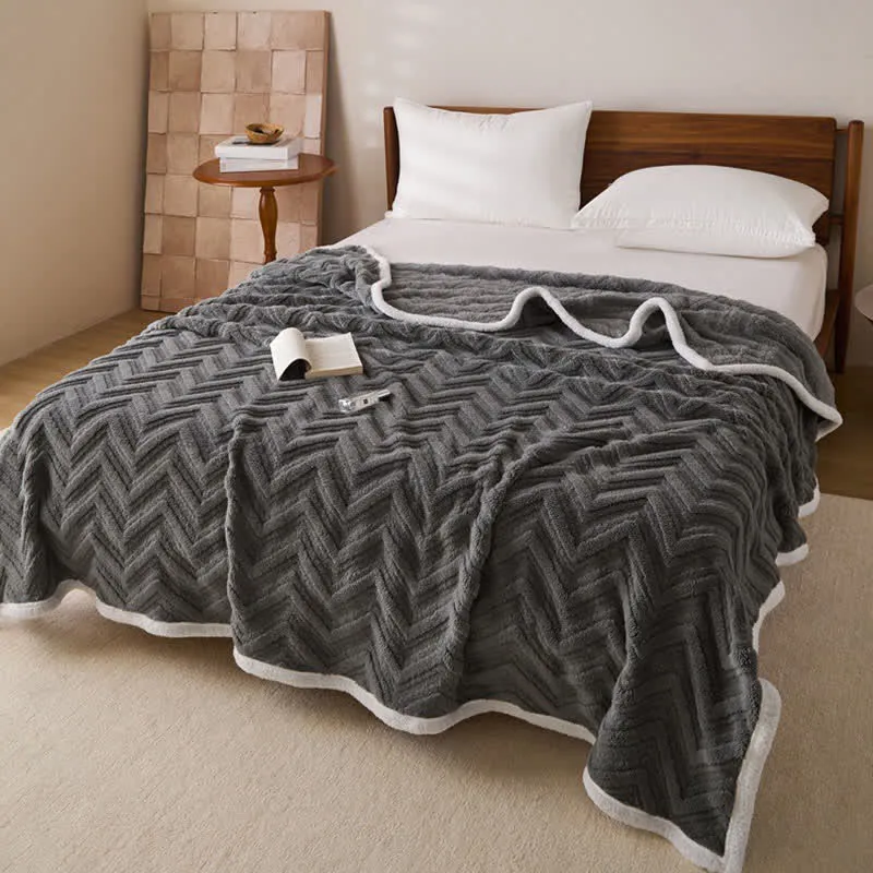 Moderne warme Jacquarddecke mit Chevron-Muster