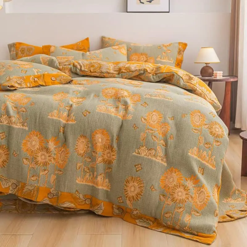 Wende-Bettwäscheset aus Baumwollgaze mit Sonnenblumenmotiv (4-teilig)