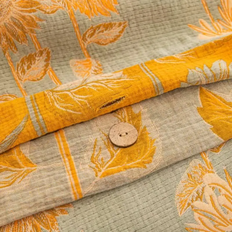 Wende-Bettwäscheset aus Baumwollgaze mit Sonnenblumenmotiv (4-teilig)