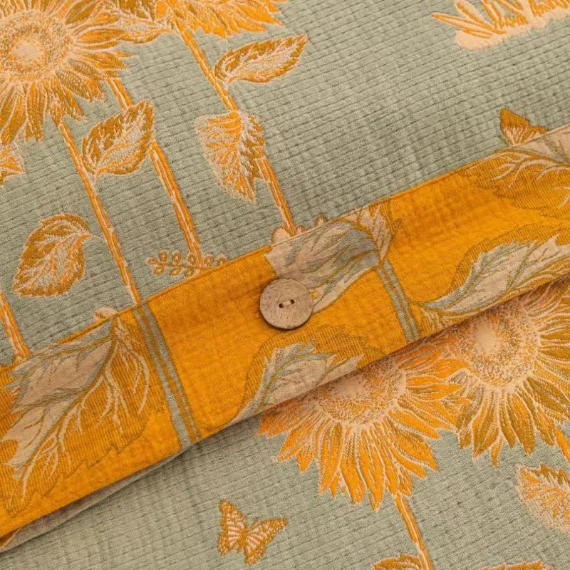 Wende-Bettwäscheset aus Baumwollgaze mit Sonnenblumenmotiv (4-teilig)